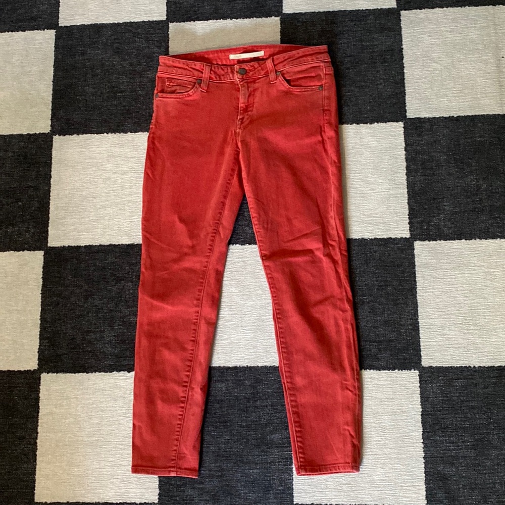 VINCE faded red jeans